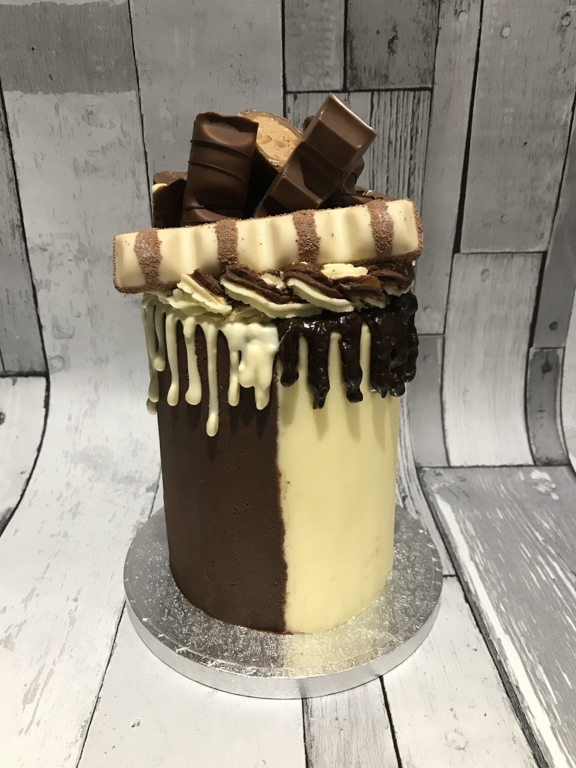 4 inch chocolate loaded drip cake